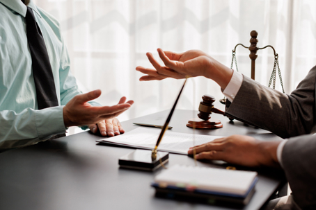 client talking with lawyer